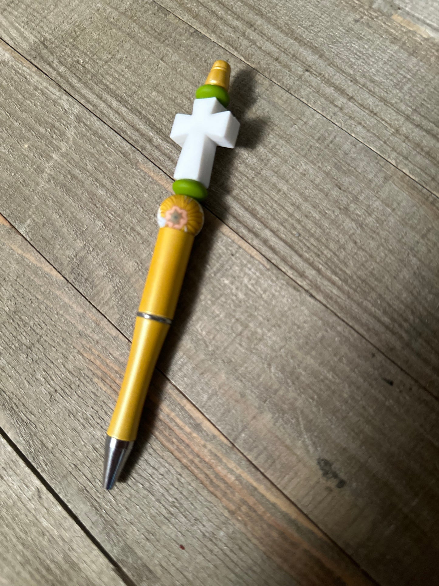 White Cross Yellow Pen