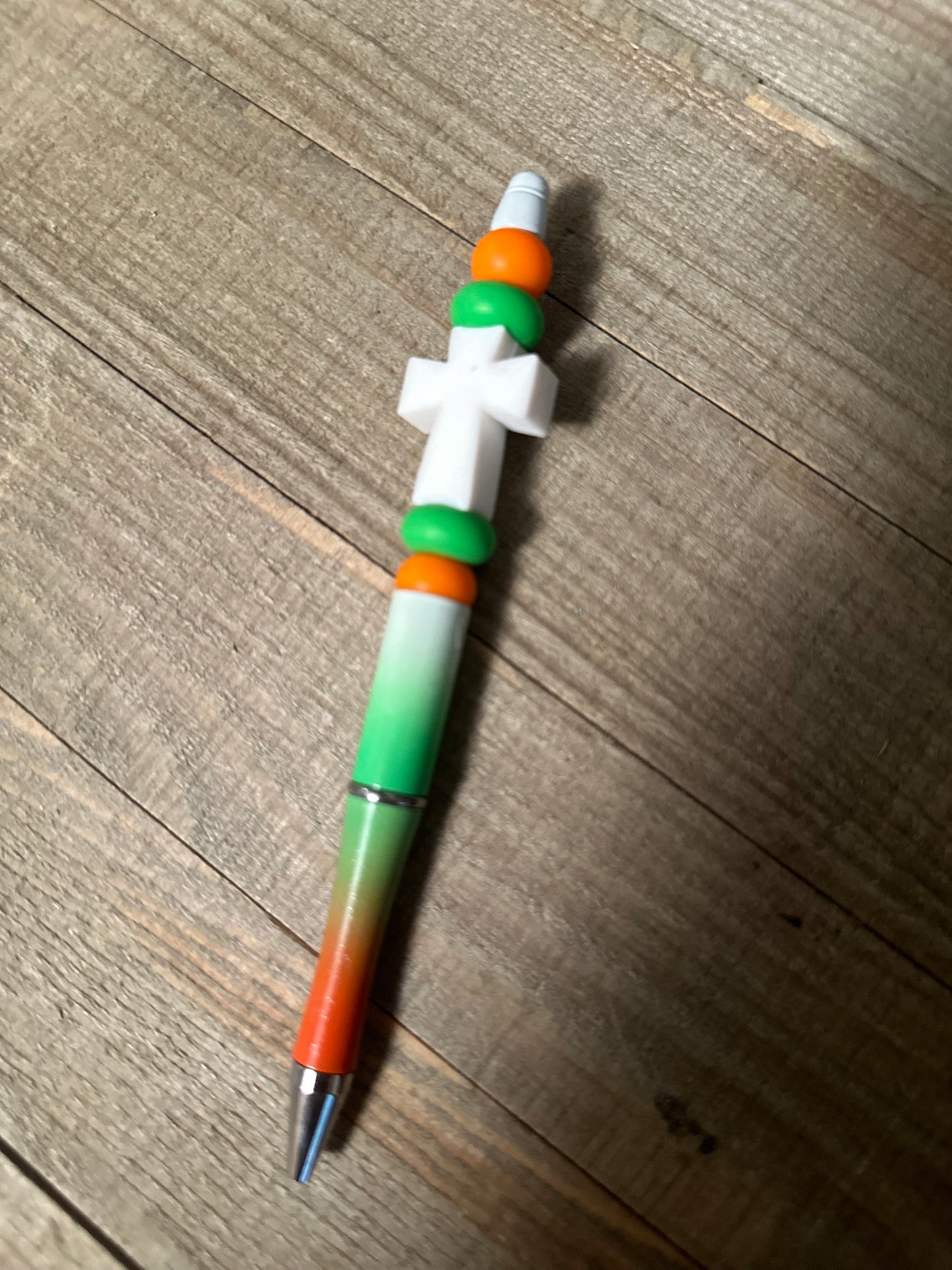 White Cross Orange and Green Pen